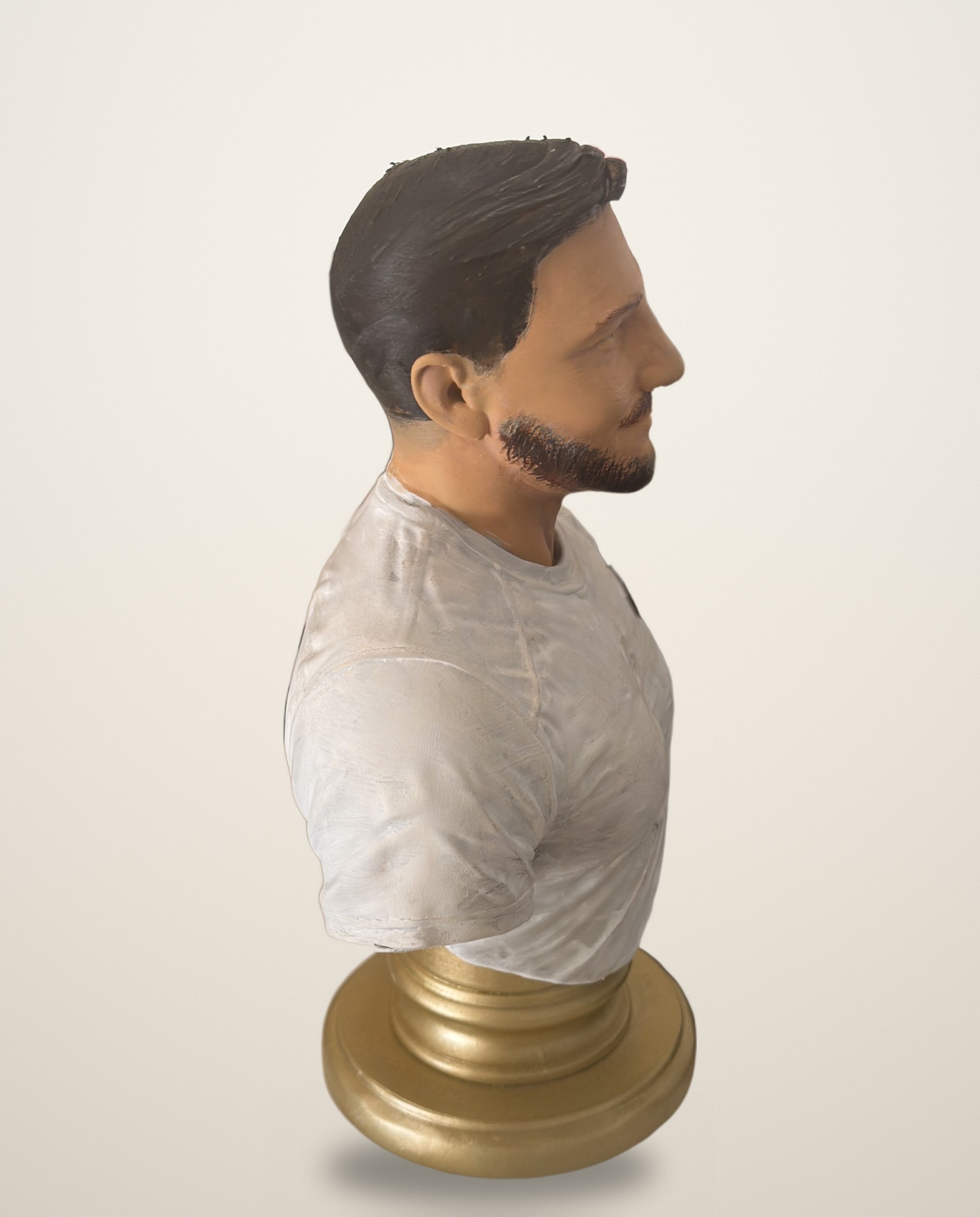 Profile view of the same hand-painted portrait bust